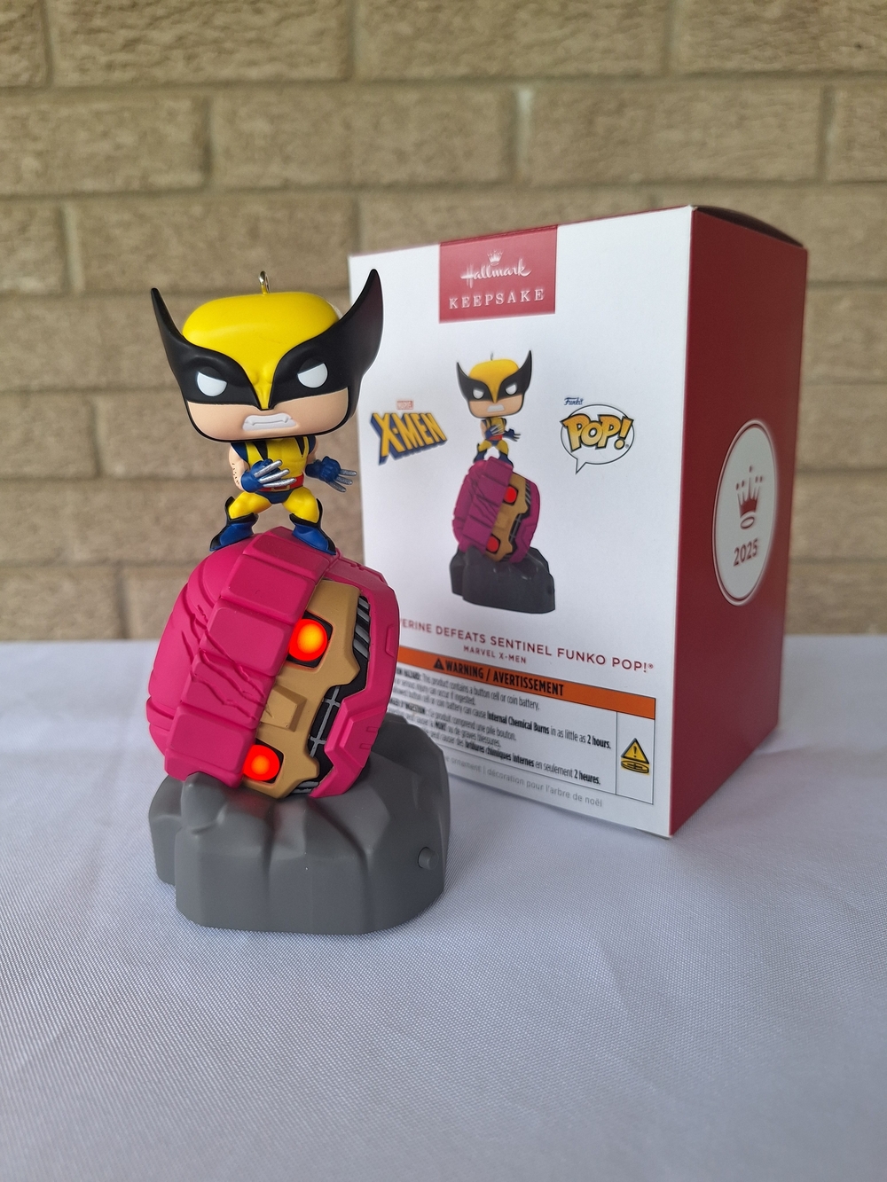 Wolverine Defeats Sentinel Funko Pop! Ornament - Yellow, Pink